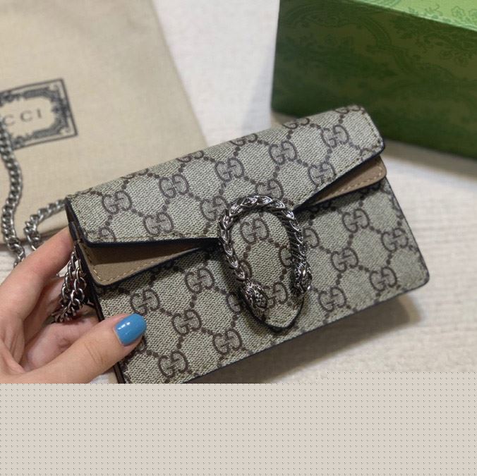 G*u*i satchel bags